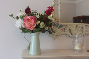 Finest Faux flowers available in Ireland displayed in a country style jug with peonies and artificial foliage 